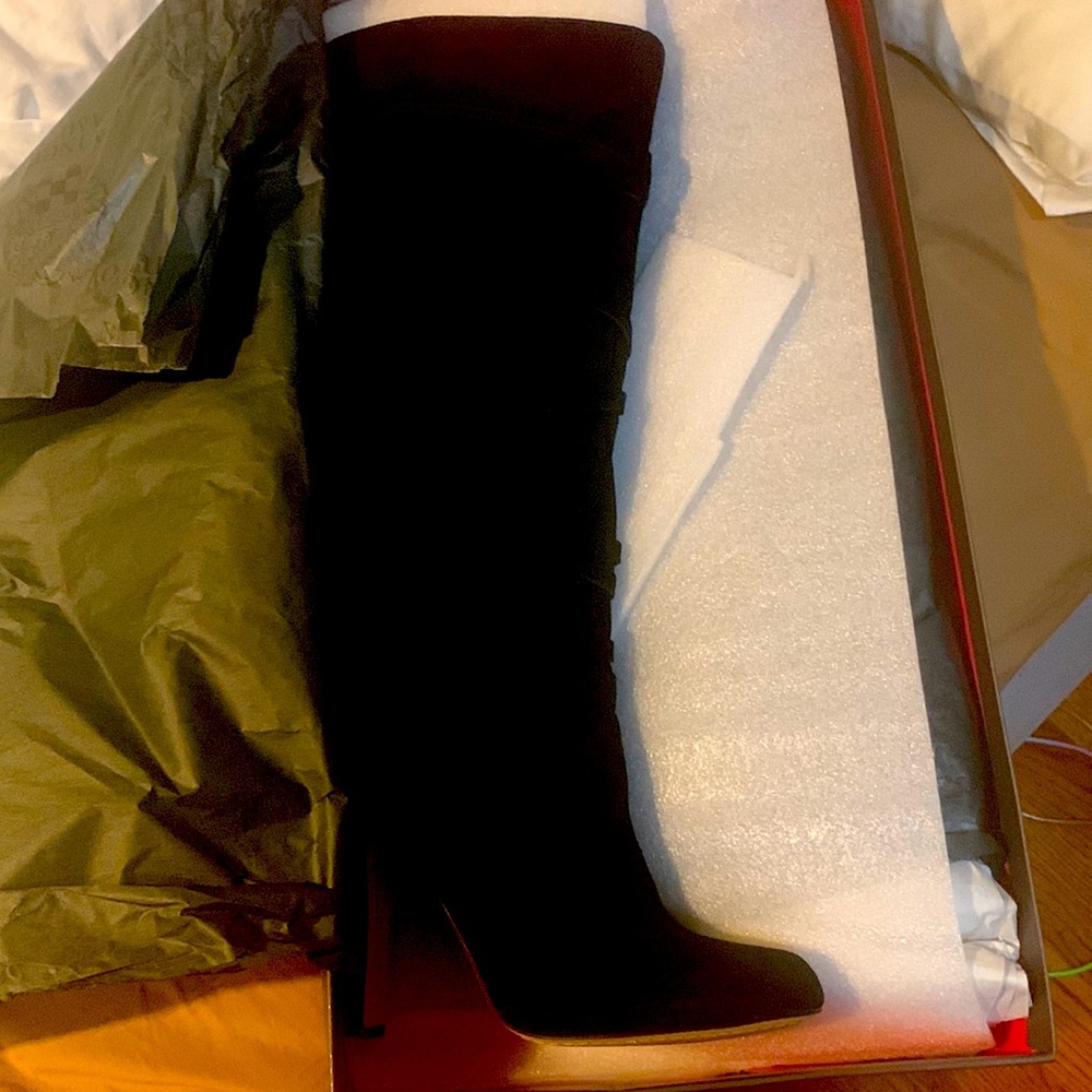 Vince Camuto heeled boots . Never worn